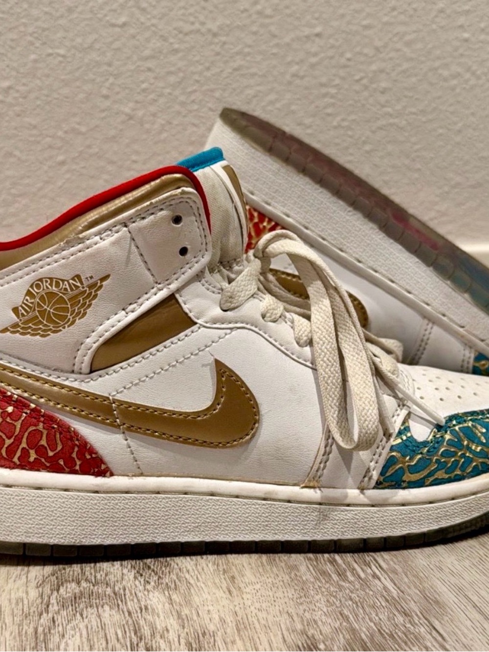 Jordan Kids White High-Top Sneakers with Gold, Teal & Red Accents